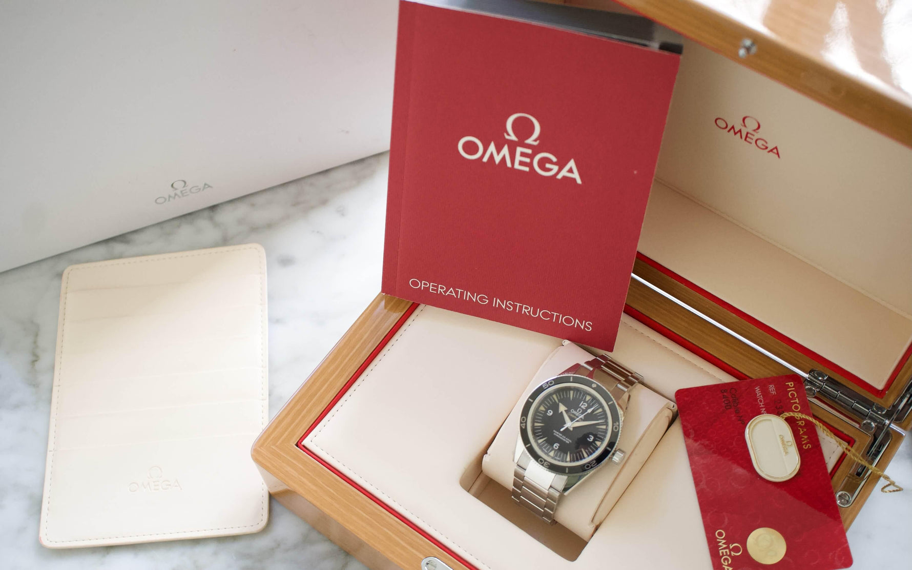 SOLD OUT: Omega Seamaster 300m Liquidmetal 233.30.41.21.01.001 41MM Co-Axial Black Steel Box and Pictogram Card 2019 - WearingTime Luxury Watches