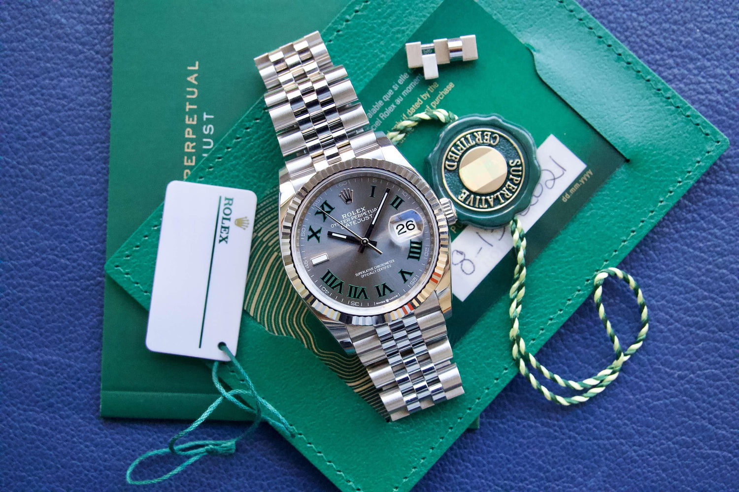 SOLD: ROLEX DATEJUST 36 WIMBLEDON Jubilee 126234 GREEN Rhodium ROMAN Box and Papers 18K Bezel - WearingTime Luxury Watches