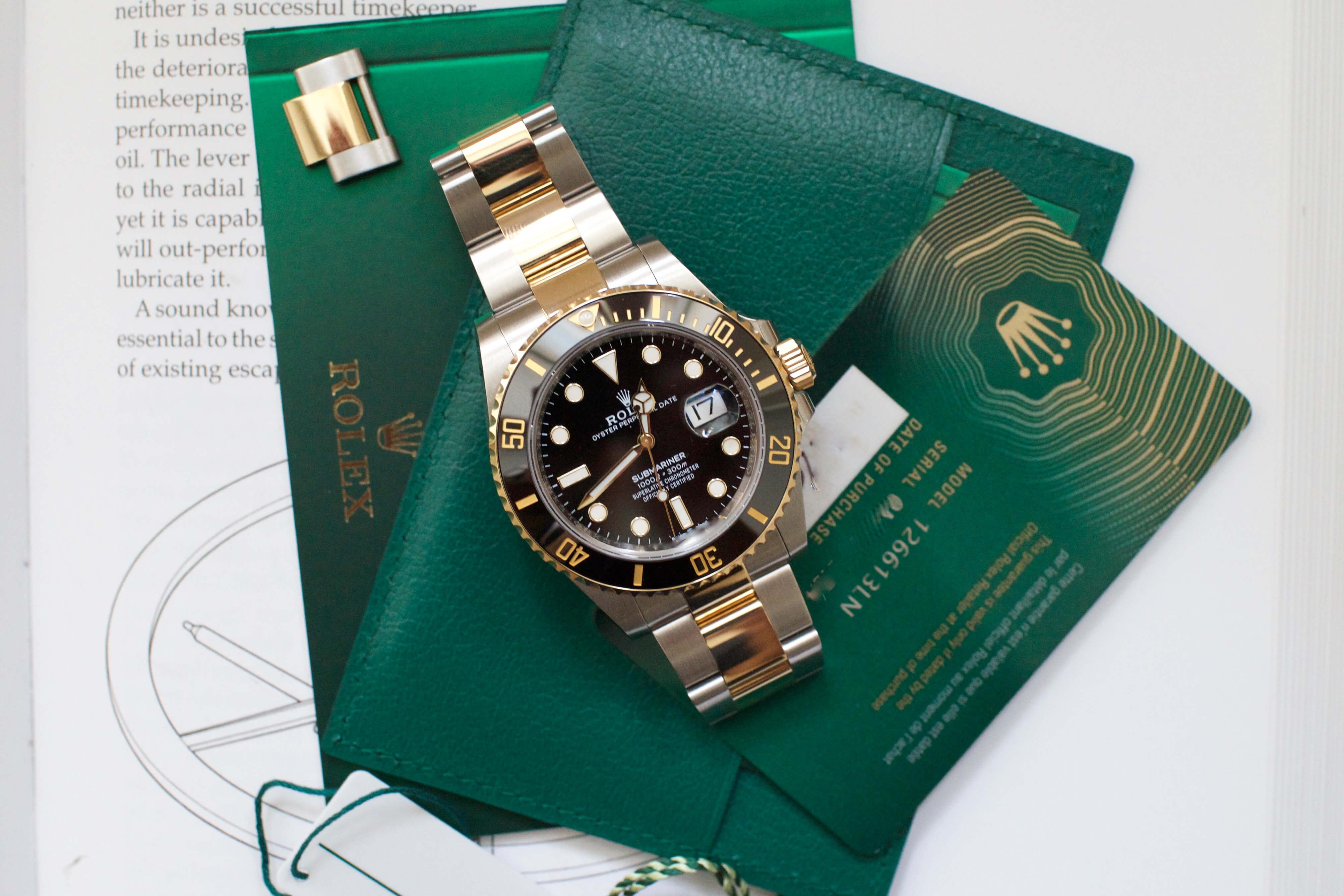 Rolex submariner two outlet tone green