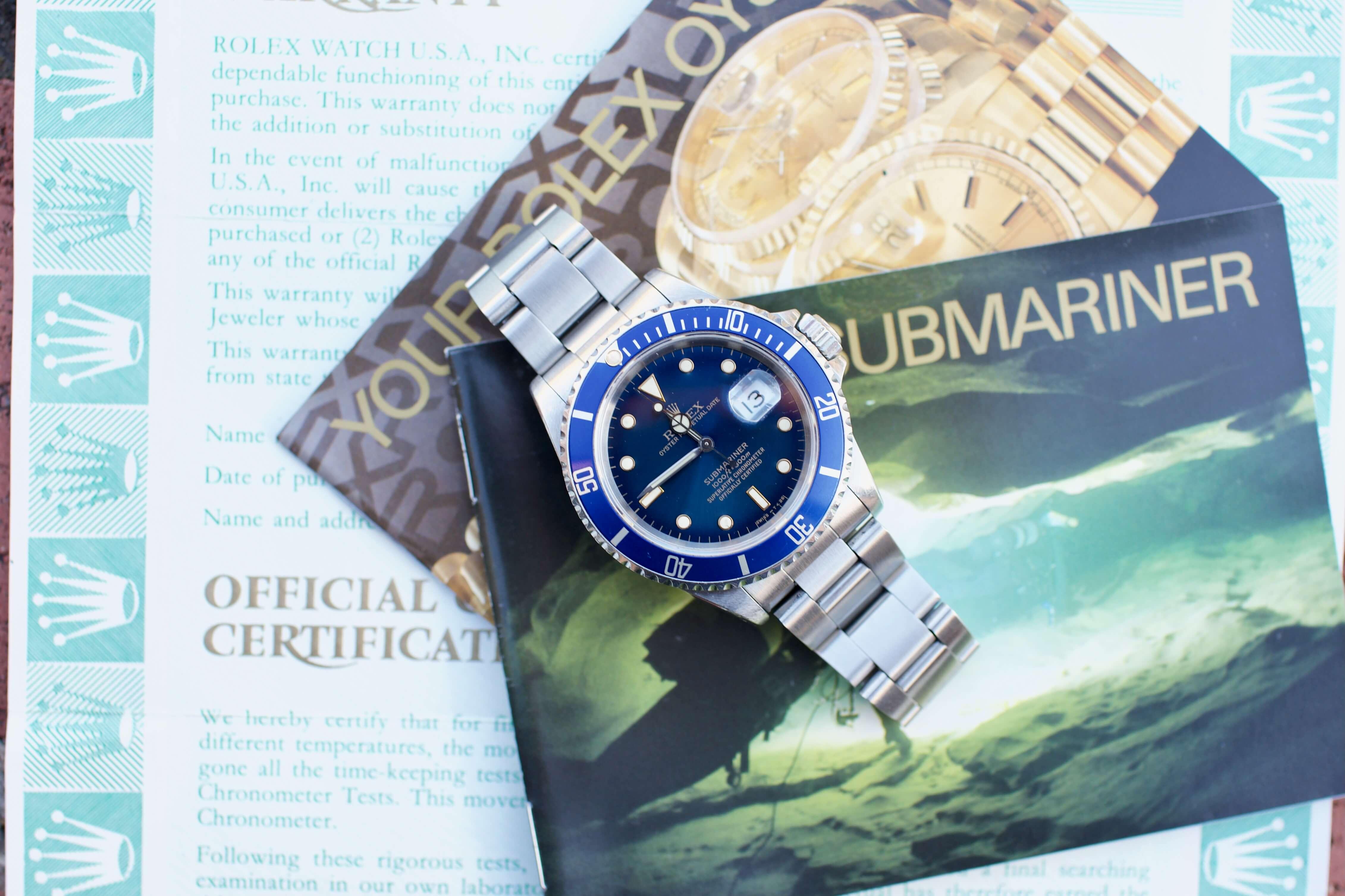 Rolex submariner black on sale dial blue bezel